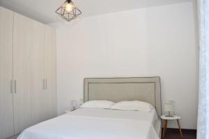 Postel nebo postele na pokoji v ubytování Lalzit Bay Dream Villa - Happy Rentals
