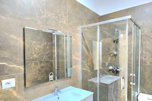 Koupelna v ubytování Lalzit Bay Dream Villa - Happy Rentals + 33 fotografií