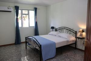 Voodi või voodid majutusasutuse Panoramic Seaview suite toas