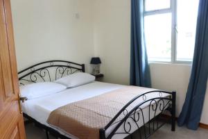 Voodi või voodid majutusasutuse Panoramic Seaview suite toas