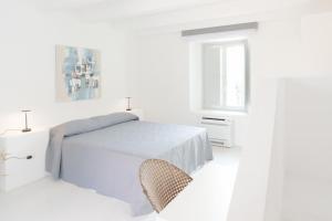 Postel nebo postele na pokoji v ubytování San Giuseppe Relais