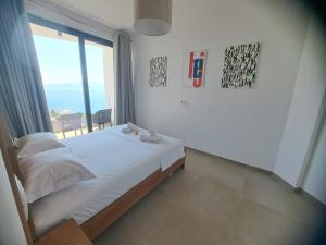 Ένα ή περισσότερα κρεβάτια σε δωμάτιο στο prestige hill apartments