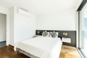 Platinum - Luxury Suite客房内的一张或多张床位