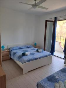 Postel nebo postele na pokoji v ubytování Terrazza Michelino