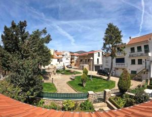 a view of the courtyard of a apartment building at Pure Mountain - Serra da Estrela in Erada