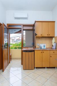 Kuchyň nebo kuchyňský kout v ubytování Hotel Olti