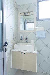 Koupelna v ubytování Hotel Olti + 20 fotografií