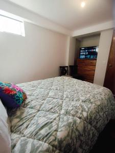 Postelja oz. postelje v sobi nastanitve intikilla hostal