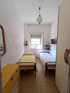 Postel nebo postele na pokoji v ubytování Casa Alessandra