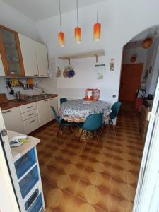 Kuchyň nebo kuchyňský kout v ubytování Casa Alessandra