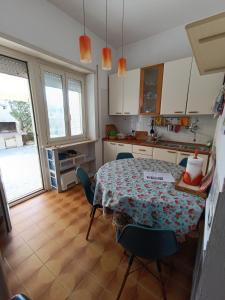 Kuchyň nebo kuchyňský kout v ubytování Casa Alessandra