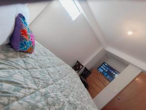 Postelja oz. postelje v sobi nastanitve intikilla hostal