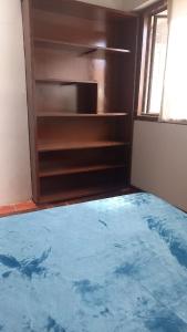 Postel nebo postele na pokoji v ubytování Habitación en Chicó Reservado 13a 98