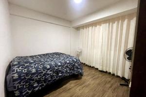 En eller flere senge i et værelse på Comodidad en un solo lugar