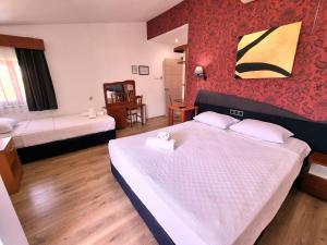 Postel nebo postele na pokoji v ubytování Şima Hotel Kemer