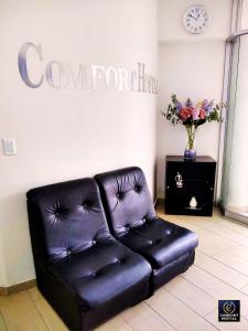 Posezení v ubytování Comfort Hostal Lima