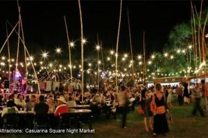 a crowd of people at an outdoor event at night at Yanti at Nightcliff - Foreshore - Pool - Shops & Cafe in Nightcliff