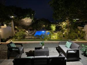 Πισίνα στο ή κοντά στο Villa Grand Jardin