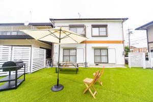 Aed väljaspool majutusasutust Miraie Yokkaichi Aobacho