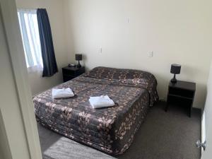 Postel nebo postele na pokoji v ubytování Cheviot Hotel + 14 fotografií