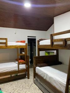 Postel nebo postele na pokoji v ubytování Casa turistica JB