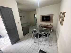 TV a/nebo společenská místnost v ubytování Casa Garanhuns Ursula D 2