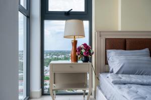 Postel nebo postele na pokoji v ubytování Sophia Apartment - Sophia Center Phu Cuong