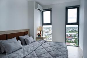 Postel nebo postele na pokoji v ubytování Sophia Apartment - Sophia Center Phu Cuong