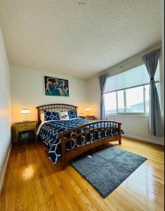 Ένα ή περισσότερα κρεβάτια σε δωμάτιο στο Ocean Breeze Coastal Getaway