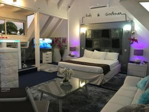 En eller flere senge i et værelse på Plage St-Anne T4 duplex