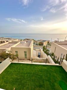 a view of the ocean from the balcony of a house at Queens Luxury Vila 111B in Vlorë