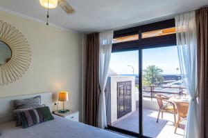 Postel nebo postele na pokoji v ubytování Panoramic View Sunflower By Dream Homes Tenerife + 27 fotografií
