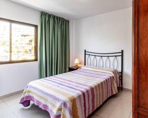 Posteľ alebo postele v izbe v ubytovaní Cozy 2b Apt By The Beach By Dream Homes Tenerife + 32 fotografií