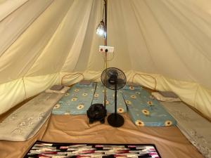 Voodi või voodid majutusasutuse Rasa Durio Eco Glampz toas