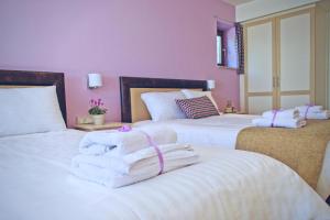 Posteľ alebo postele v izbe v ubytovaní Arktos Hotel + 37 fotografií