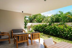 Сад в Appartement moderne de 3 chambres avec jardin près de la plage