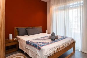 Кровать или кровати в номере Appartement moderne de 3 chambres avec jardin près de la plage