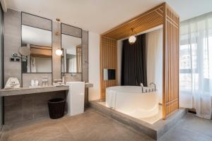 Fotografie z fotogalerie ubytování Yue Xin Yuan Spa Resort v destinaci Mile