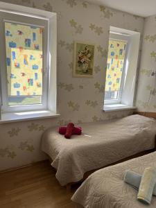 Postelja oz. postelje v sobi nastanitve Apartment Jūros Mėlis