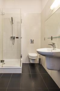 Kúpeľňa v ubytovaní udanypobyt Apartament z Basenem