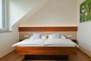 Postel nebo postele na pokoji v ubytování Mittagspitze