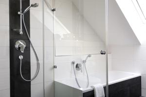 Koupelna v ubytování Mittagspitze + 7 fotografií