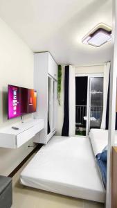 Letto o letti in una camera di Harmonious Hideaway