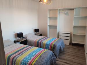 En eller flere senge i et værelse på résidence Valport T3 4 pers 2 chambres