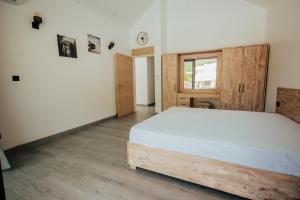 Letto o letti in una camera di Two Villas