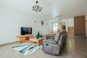 TV o dispositivi per l'intrattenimento presso Two Villas