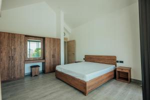 Кровать или кровати в номере Two Villas +32 фотографии