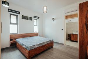 Letto o letti in una camera di Two Villas