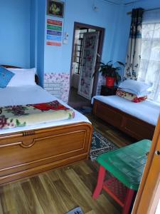 Postel nebo postele na pokoji v ubytování Kalimpong View Homestay + 15 fotografií