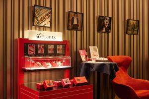 a store with a red table and a chair at Kobe Motomachi Tokyu REI Hotel in Kobe